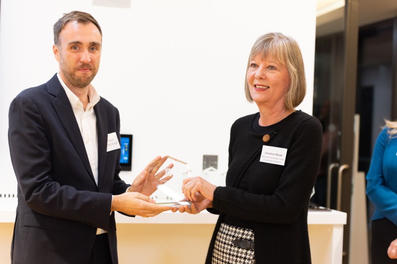 Caroline receiving her award for Alumni Innovation and Inspiration